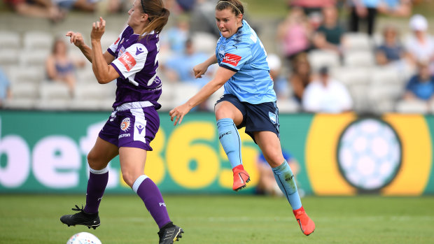 Star turn: Savannah McCaskill blasts the ball past the Glory goalkeeper.