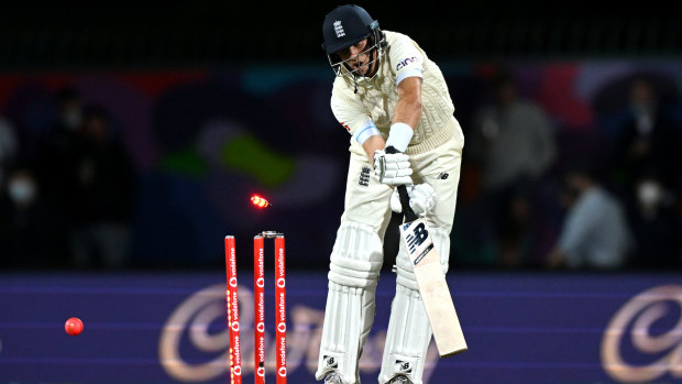 Joe Root is bowled by Scott Boland during the fifth Test in Hobart earlier this year. 