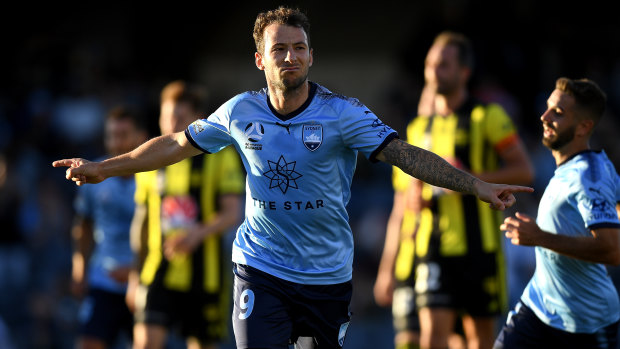 Stuttering: Adam Le Fondre celebrates after converting from the spot at Campbelltown Sports Stadium - yet another Sydney set-piece goal.
