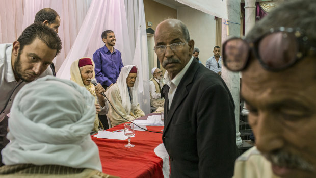 Members of Tunisia's Truth and Dignity Commission meet with  victims in Kebili, Tunisia, in 2015.
