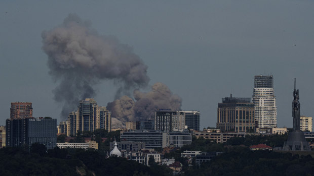 Smoke rises over the Kyiv skyline after a Russian attack.