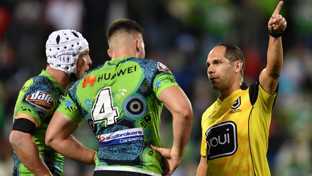 Nick Cotric is sent off by referee Ashley Klein against the Dragons at WIN Stadium.