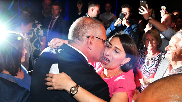 Basking in Berejiklian's afterglow? Scott Morrison with the NSW Premier on the night of her election victory last month.