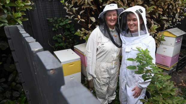 Kirsten Roach and her daughter Jaimes Bowe at home in Blackburn with their bees in the house Ms Roach will sell to take her  corporate work-life remote in a new home in Bairnsdale.