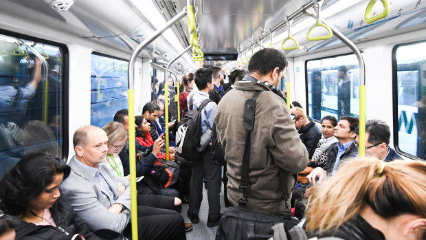 Passengers on a metro train on Monday morning.