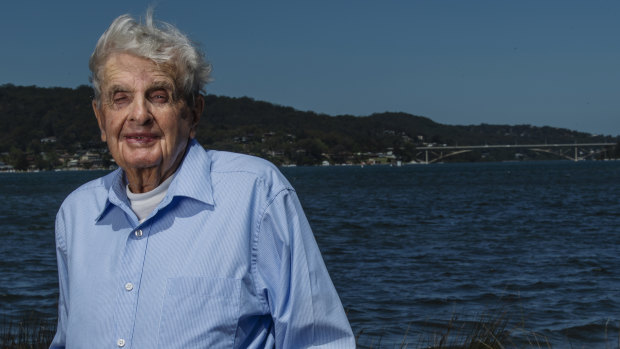 A life building bridges: John Eveston at home in Woy Woy with the Rip Bridge in the background. 