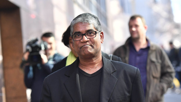 Roger Singaravelu outside Melbourne Magistrates Court earlier this year following an appearance by Momena Shoma, the Bangladeshi woman who stabbed him.