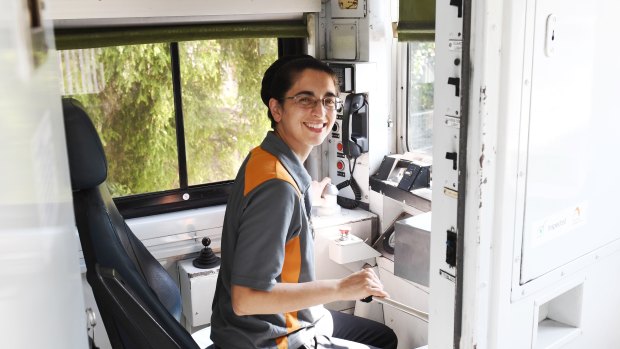 Train driver Thea Pratt prepares to depart Lidcombe station.