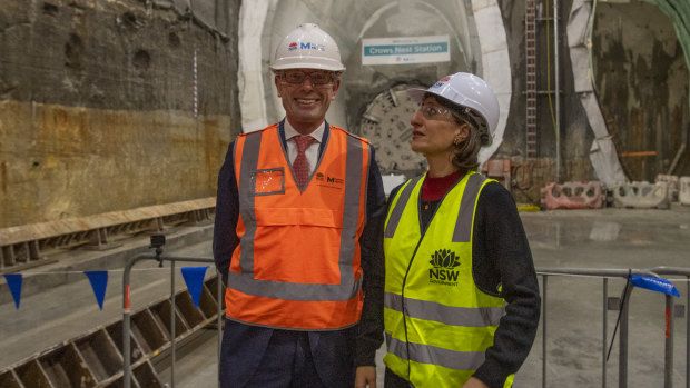 Premier Gladys Berejiklian and Treasurer Dominic Perrottet at the site of a metro station site last year.