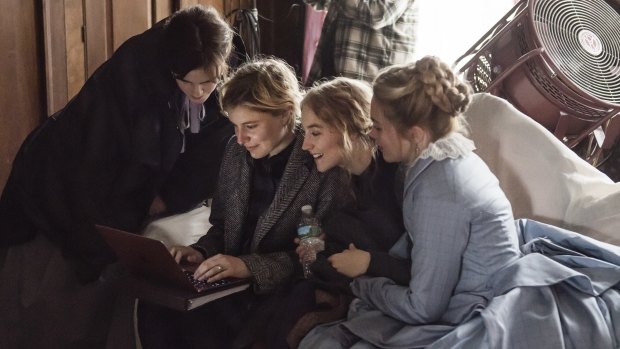 Emma Watson, director Greta Gerwig, Saoirse Ronan and Florence Pugh on the set of Little Women.