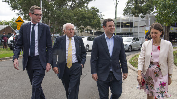 Treasurer Dominic Perrottet, former prime minister John Howard, Sports Minister Stuart Ayres and Premier Gladys Berejiklian in Penrith on Friday.