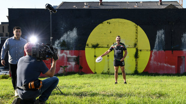 True colours: Greg Inglis cracks a laugh during the photo shoot.