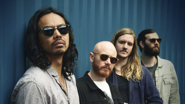 The Temper Trap and singer Dougy Mandagi (left) are marking the 10th anniversary of breakthrough single Sweet Disposition. 