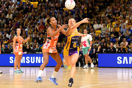 Maddy McAuliffe (right) in action for Sunshine Coast Lightning, against the Giants’ Serena Guthrie.