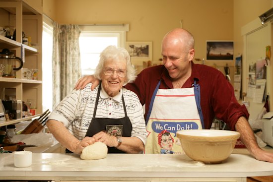 Richard Flanagan in the kitchen
with his mother, Helen, in 2005. “Making bread was my mother’s way back to her past,” he says.