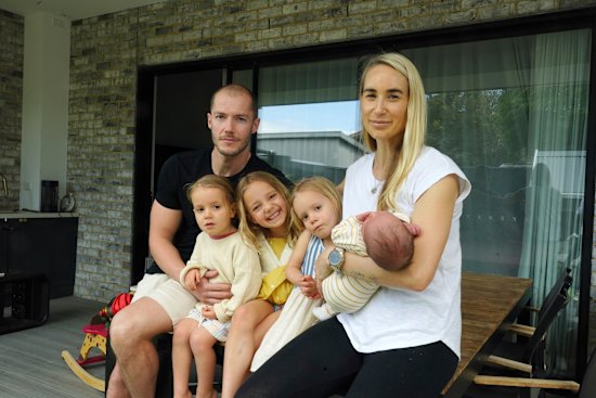 Melbourne mum and nutrition coach Danni Duncan with her husband  Chris and their children Harper, 6, twins Beau and Harlow 3, and newborn London at their home.