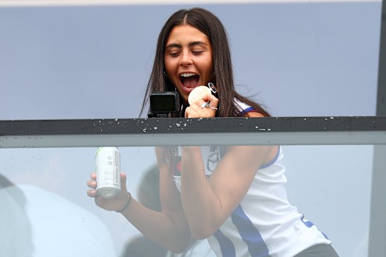 Taylah Gatt brandishing her 2025 premiership medal.