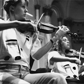 Veronique Serret, right, in the Australian Youth Orchestra in 1996 with Helen Ayres.