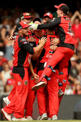 Renegades players celebrate after winning the BBL final.
