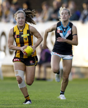 Jasmine Fleming bolts forward for the Hawks.