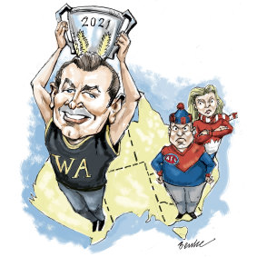Mark McGowan makes off with the premiership cup.