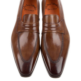 A stylish shoe is essential to
Regé-Jean Page’s wardrobe and 
Santoni loafers fit the bills.