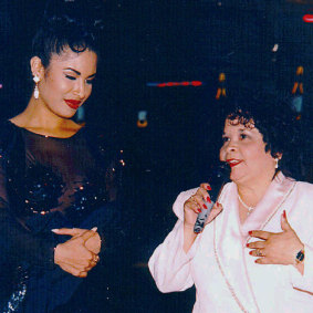 Selena (left) with fan club president and, later, convicted murderer Yolanda Saldivar at a Tejano Music Awards party in 1994.