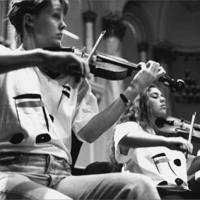 Veronique Serret, right, in the Australian Youth Orchestra in 1996 with Helen Ayres.