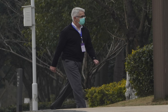Dominic Dwyer, member of the World Health Organization team, walks in the cordoned hotel area in Wuhan in central China’s Hubei province in February.