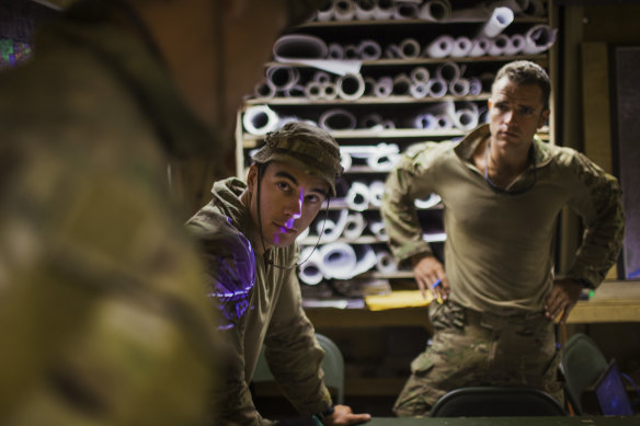 Australian soldiers in mission brief room, Tarin Kowt, Uruzgan Province, 2012.