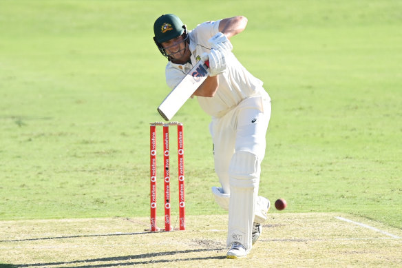 Cameron Green is all concentration with the bat at the Gabba on day one of the fourth Test.