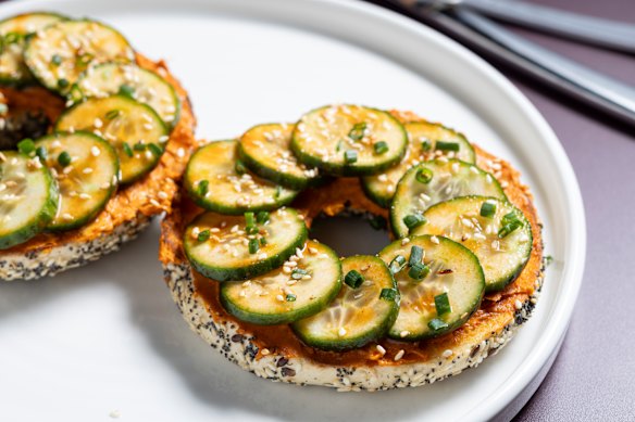 Bagels topped with cucumber and cream cheese laced with gochujang.