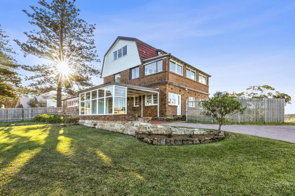 The Cameron family have bought the Cape Cod-style house overlooking Newport and Bungan beaches. 