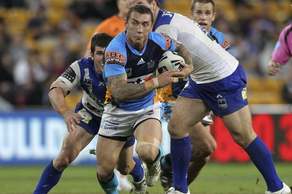 Mat Rogers playing for the Gold Coast Titans.