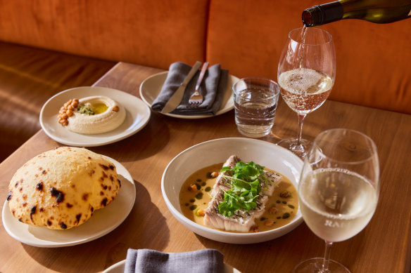 Steamed barramundi and pita bread.