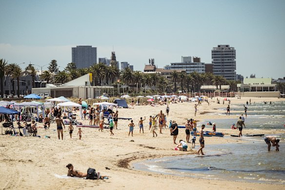 People cool off at Port Melbourne Beach on Tuesday.