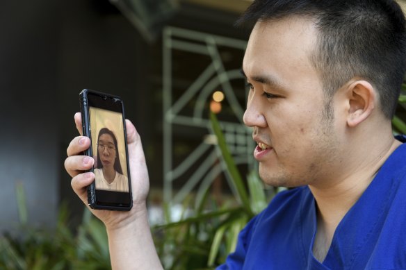 Dr Raymond Chan speaks on Facetime with his Vietnamese fiancee, Thi Dung Nguyen, who has a prospective spouse visa but cannot get a travel exemption.