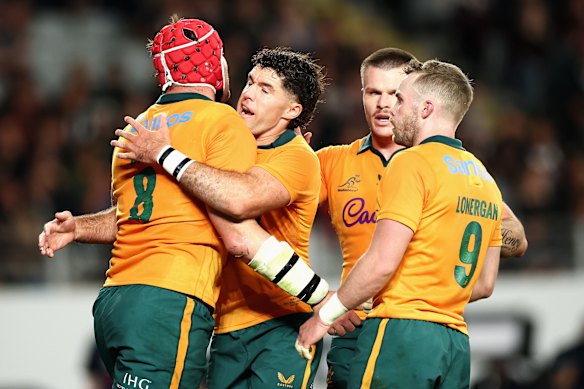 Ben Donaldson celebrates with Harry Wilson at Eden Park.