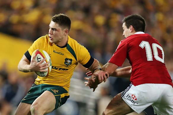 James O’Connor slipping past Jonny Sexton during the 2013 Lions tour of Australia.