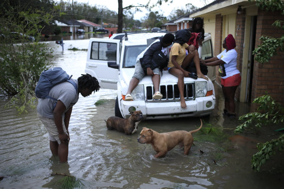 Residents wait to be rescued after Hurricane Ida in LaPlace, Louisiana.