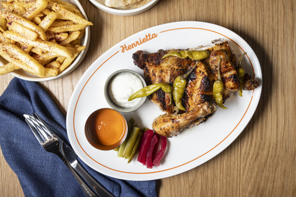 Henrietta’s charcoal chicken with pickles, condiments and chips.