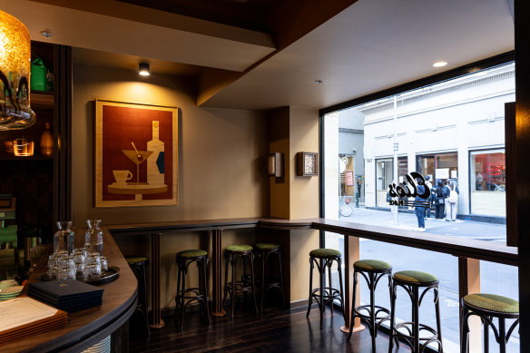 The window bench is the perfect spot for an after-work spritz during Elio’s aperitivo hour.