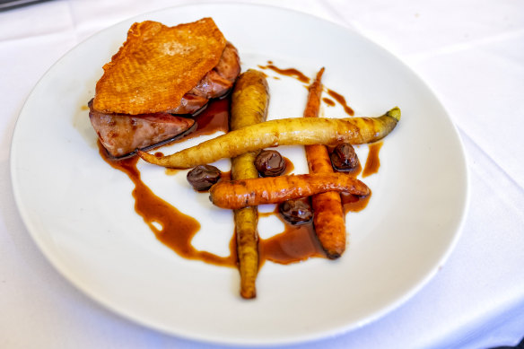 Duck breast with roasted carrots and a grappa jus at Becco.