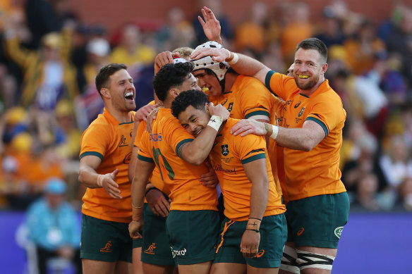 The Wallabies celebrate their win in Adelaide.