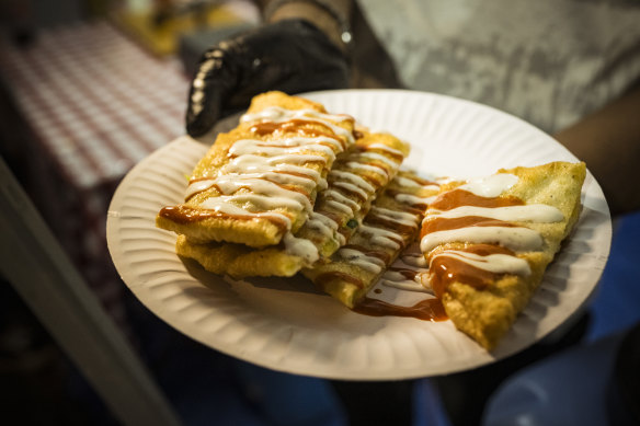 Potato bolani at Afghan Bolani comes with many different choices of sauce.