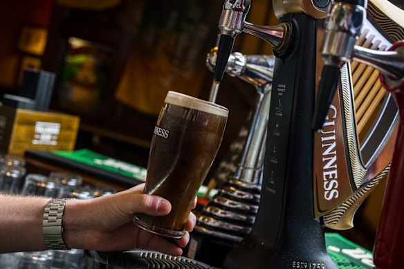 A perfectly poured pint of Guinness at The Irish Times Pub.