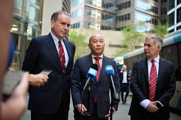 Optus chairman John Arthur, Singtel CEO Yuen Kuan Moon and Optus CEO Stephen Rue speak to the media on Tuesday morning in Sydney.