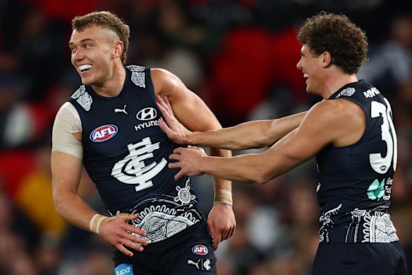 Carlton duo Patrick Cripps and Charlie Curnow.