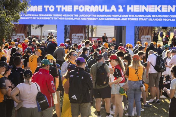 Crowds gather at the gate.