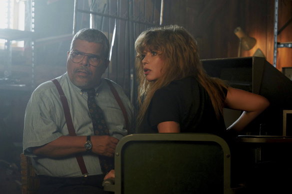 Lyonne, right, as Charlie Cale and Luis Guzman in Poker Face.